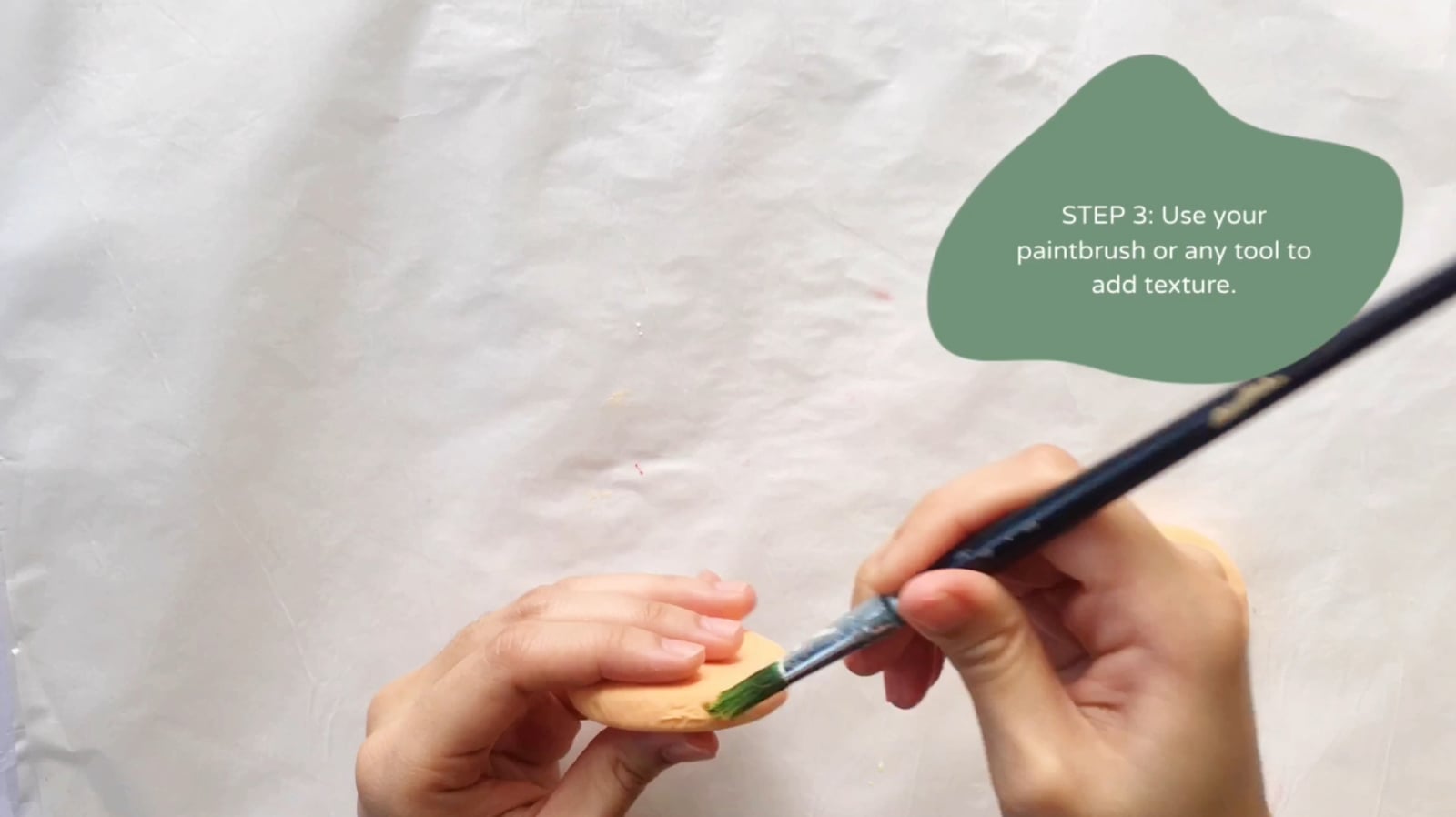 Step 3 of the DIY clay burger tutorial: Use your paintbrush or any tool to add texture.