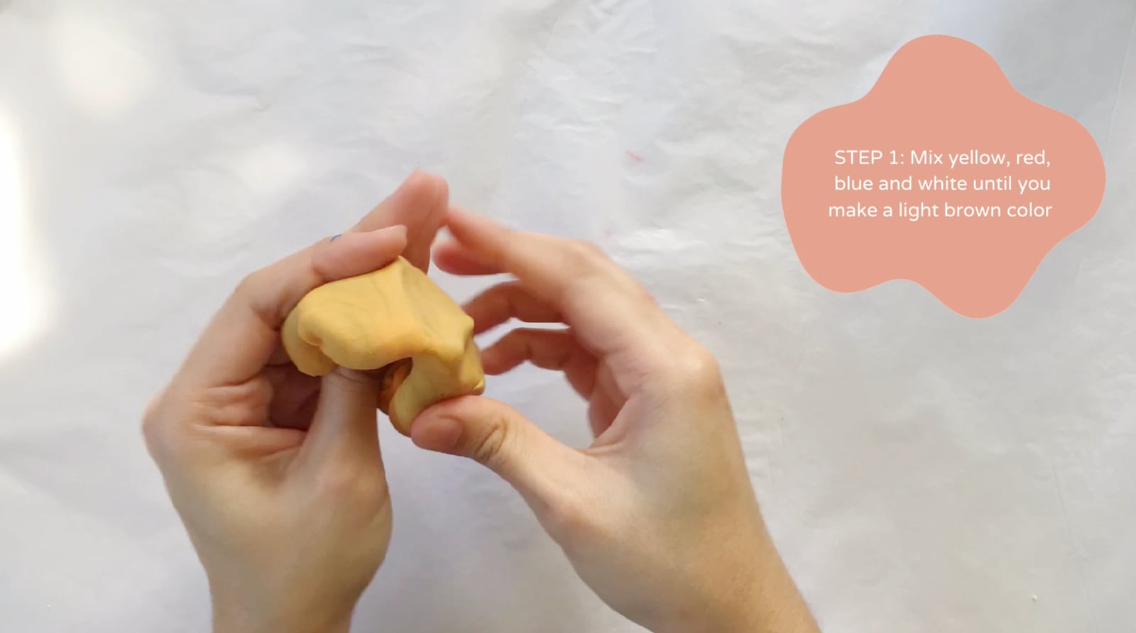 Step 1 of the DIY clay cookies tutorial: Mix yellow, red, blue, and white until you make a light brown color for the dough.