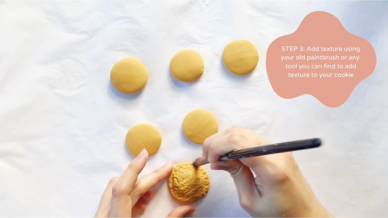 Step 3 of the DIY clay cookies tutorial: Add texture using your old paintbrush or any tool you can find.