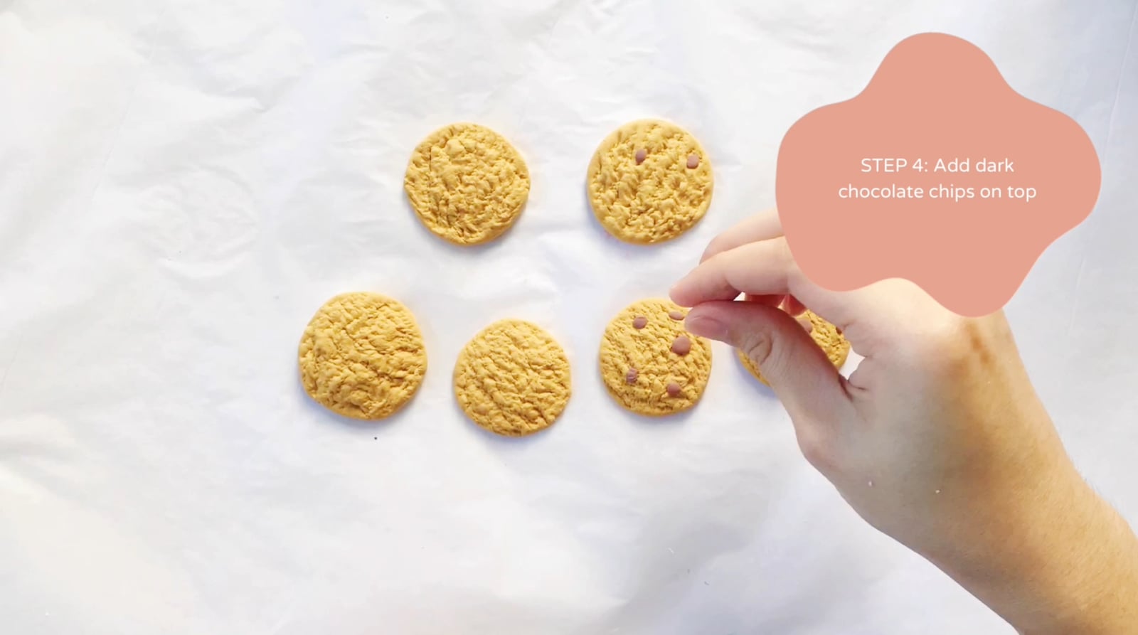 Step 4 of the DIY clay cookies tutorial: Add dark clay chocolate chips on top of your cookie.