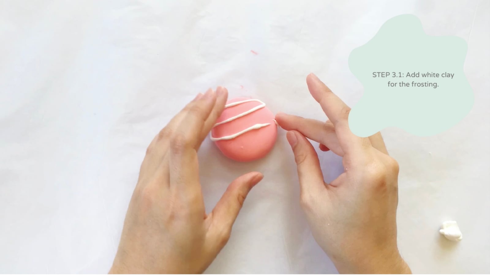 Step 3 of the DIY clay donuts tutorial: Make a pink mixture for the strawberry flavored doughnut.