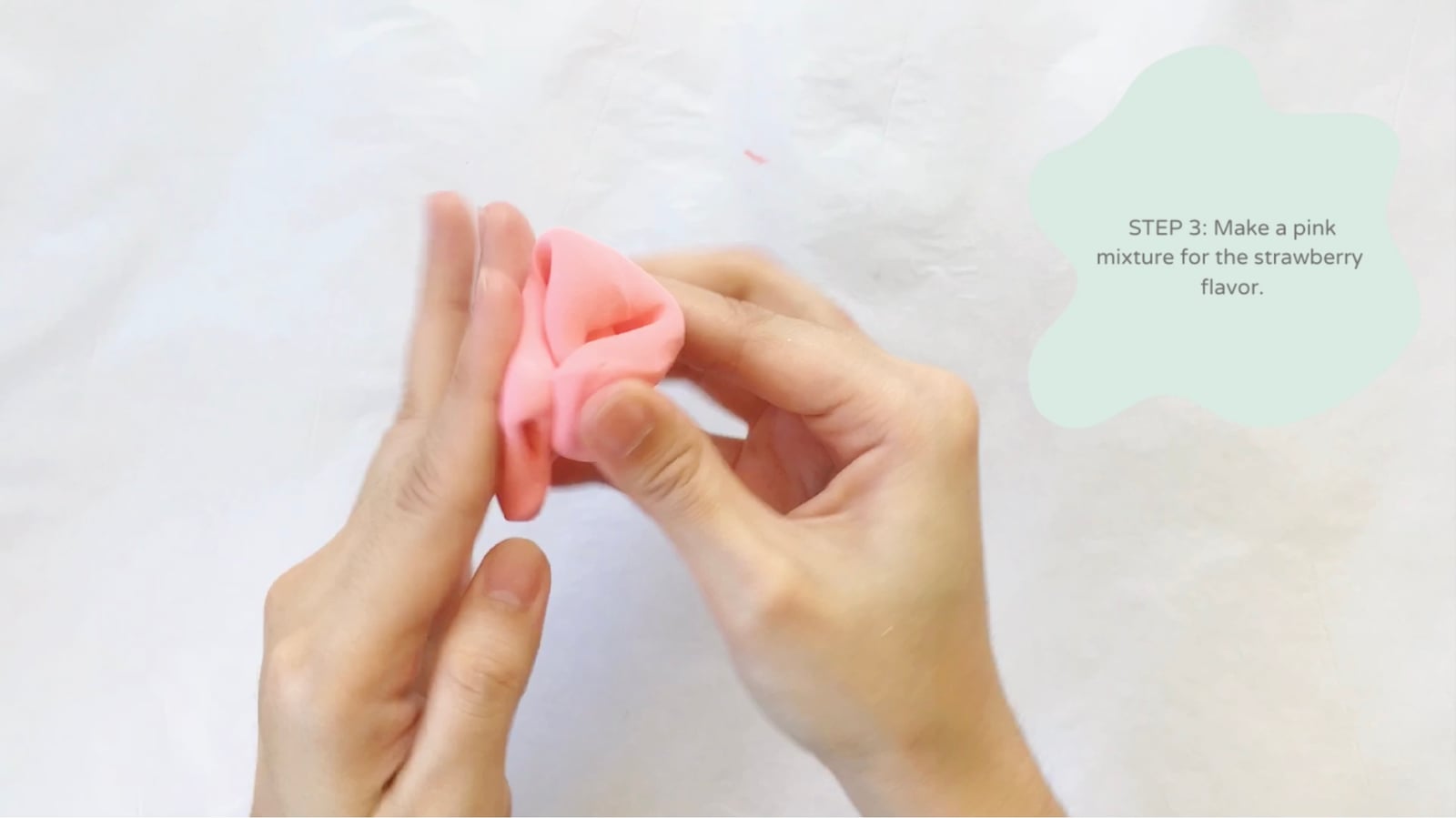 Step 3 of the DIY clay donuts tutorial: Make a pink mixture for the strawberry flavored doughnut.