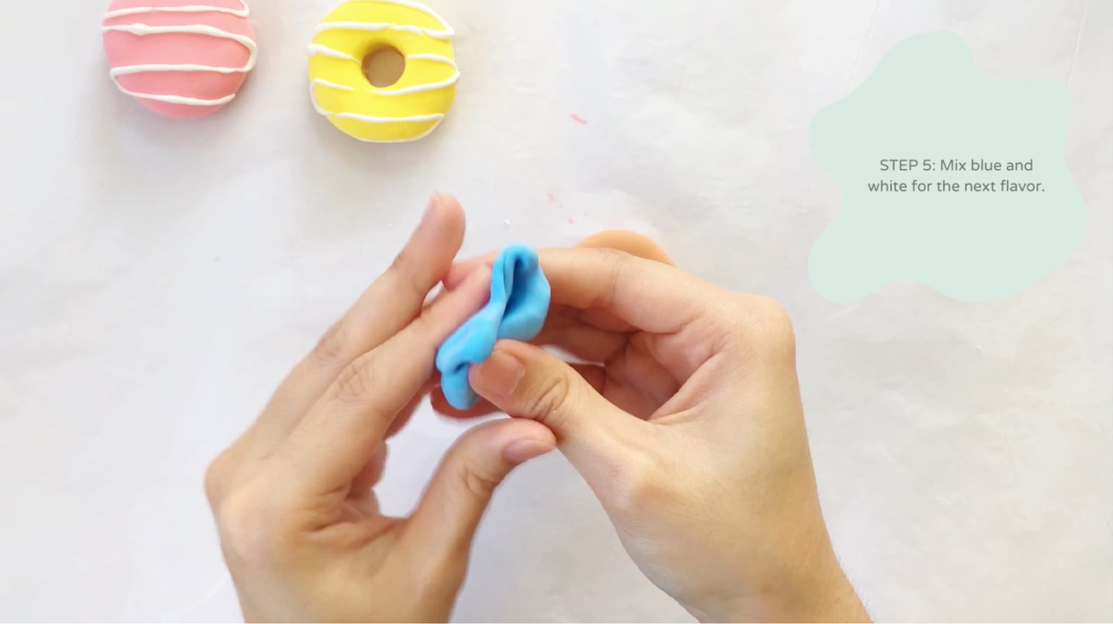 Step 5 of the DIY clay donuts tutorial: Mix blue and white for the blueberry doughnut.