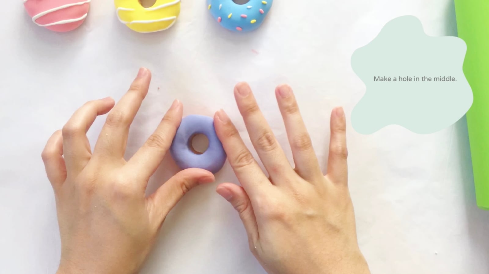 Step 6 of the DIY clay donuts tutorial: Make a purple mixture for the grape doughnut.