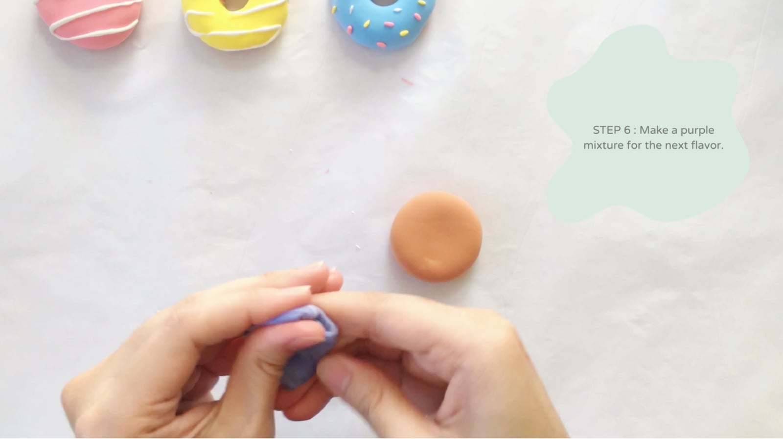 Step 6 of the DIY clay donuts tutorial: Make a purple mixture for the grape doughnut.