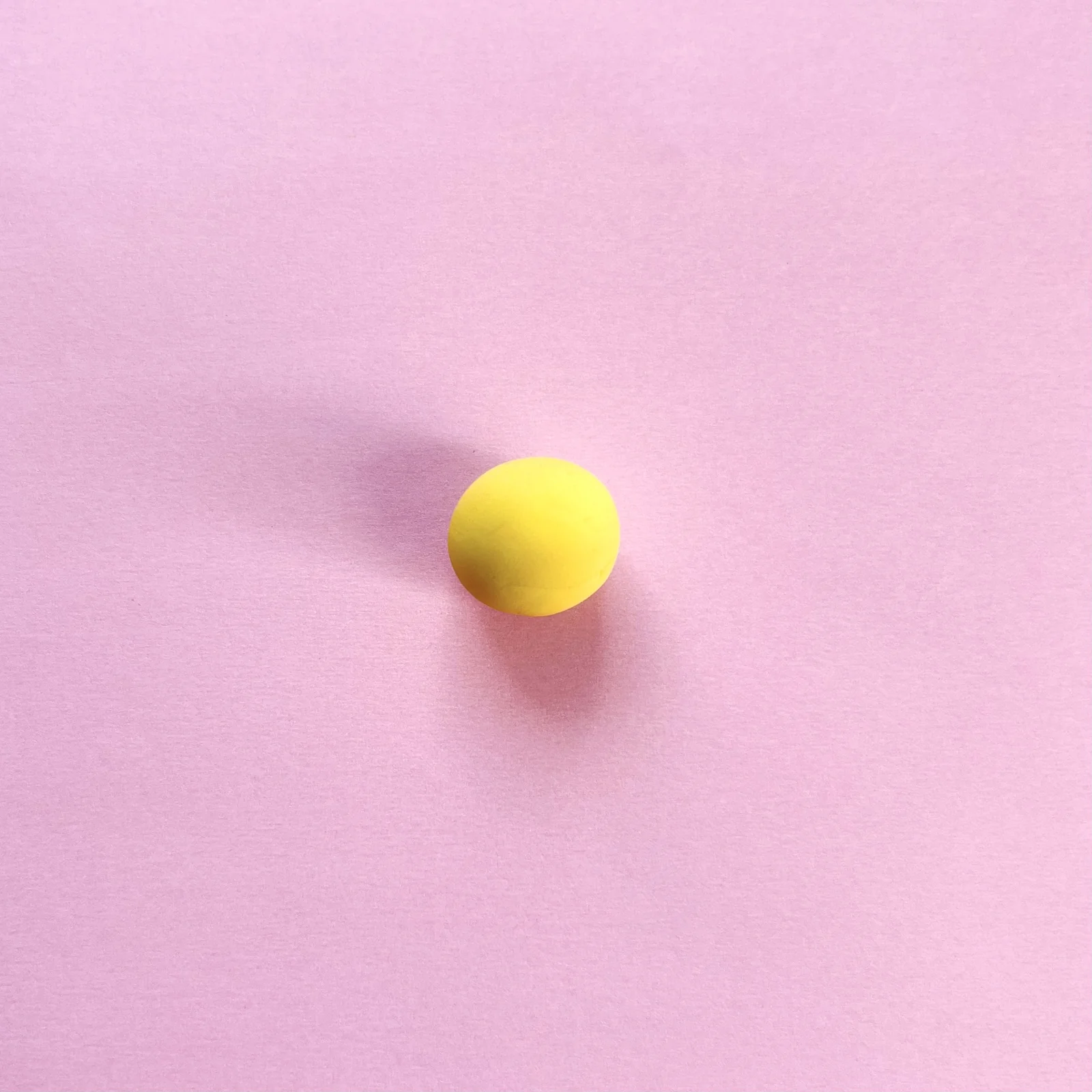 Step 1 of the mini clay animal erasers tutorial: make a small ball for the duck's head