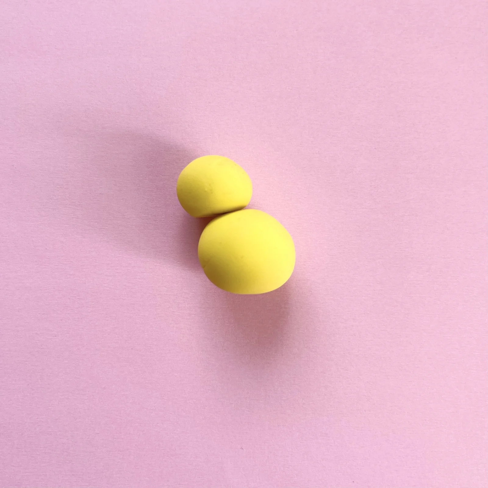 Step 3 of the mini clay animal erasers tutorial: attach the duck's body to the head