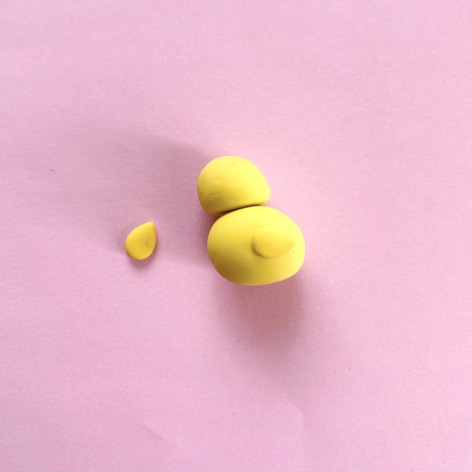 Step 4 of the mini clay animal erasers tutorial: shape the wings and attach them