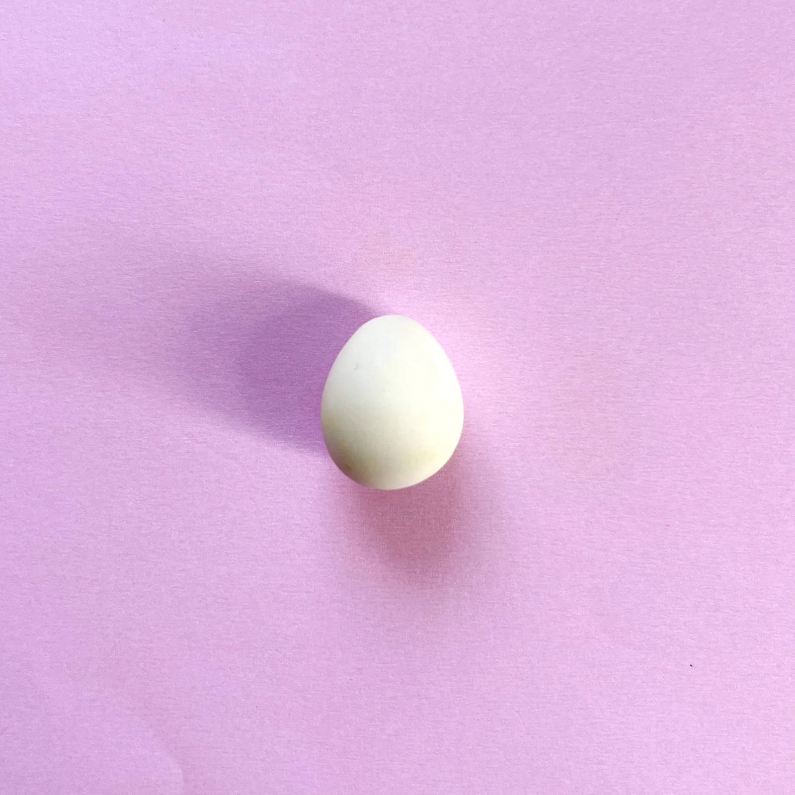 Step 1 of the mini clay food erasers tutorial: roll the white base of the egg