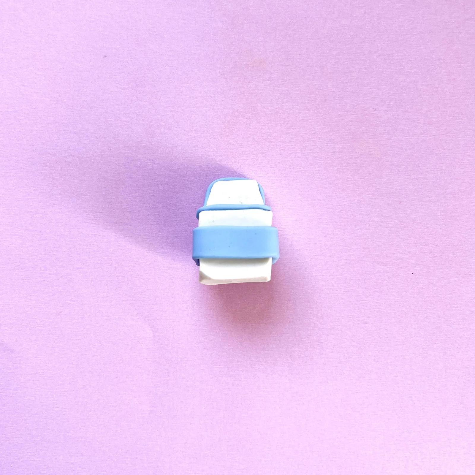 Step 3 of the mini clay food erasers tutorial: add outlines with blue clay