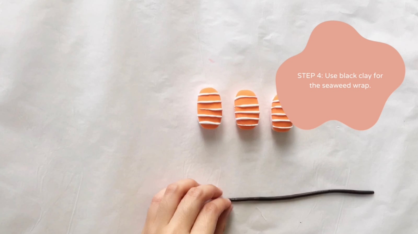 Step 4 of the DIY clay sushi tutorial: Use black clay for the seaweed wrap.