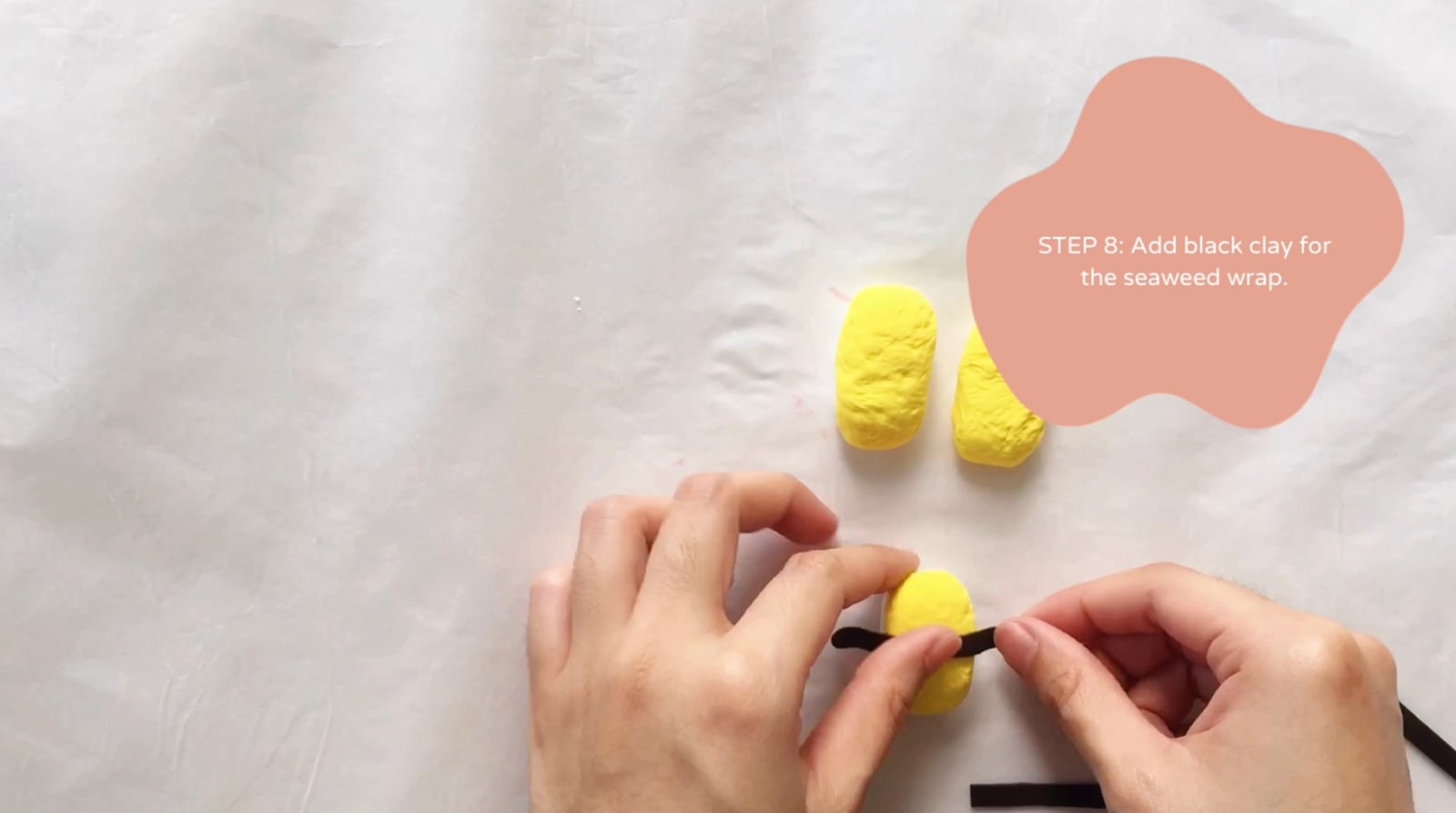 Step 8 of the DIY clay sushi tutorial: Add black clay for the seaweed wrap.