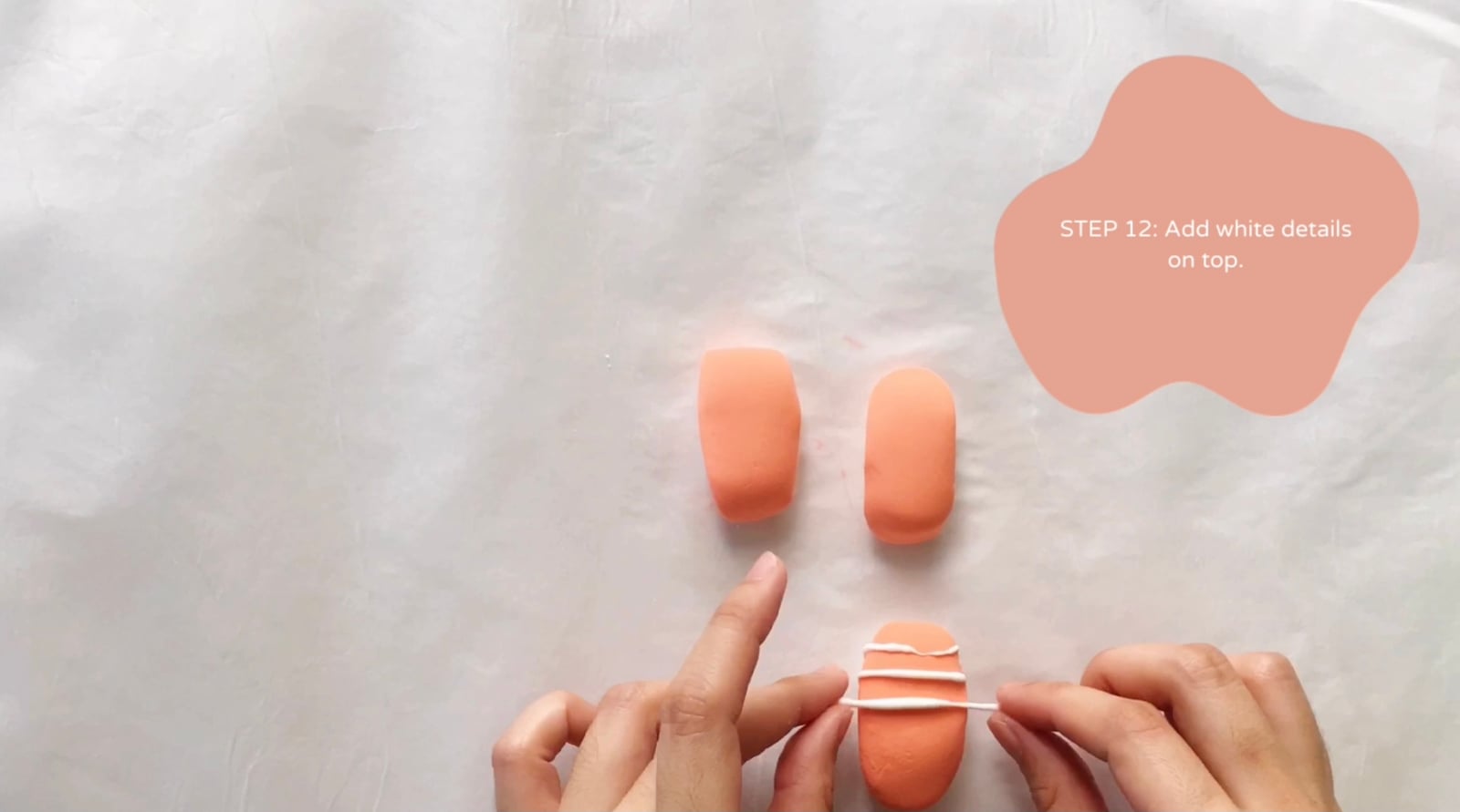Step 12 of the DIY clay sushi tutorial: Add white details on top.